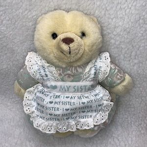 Avon teddy bear 9" plush wearing apron says I LOVE MY SISTER 1996